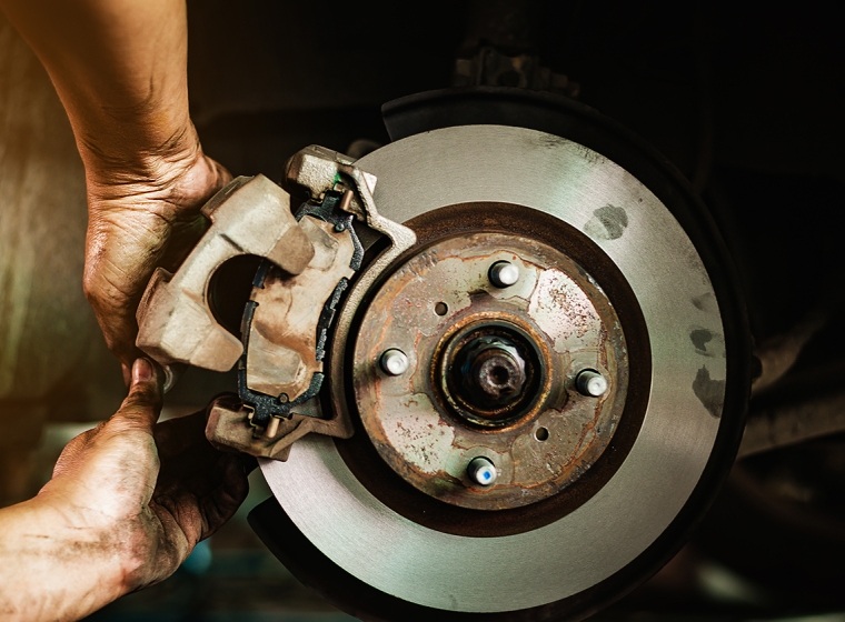 Automotive brake pads. Exponent materials engineers consult on corrosion and environment-related degradation challenges.
