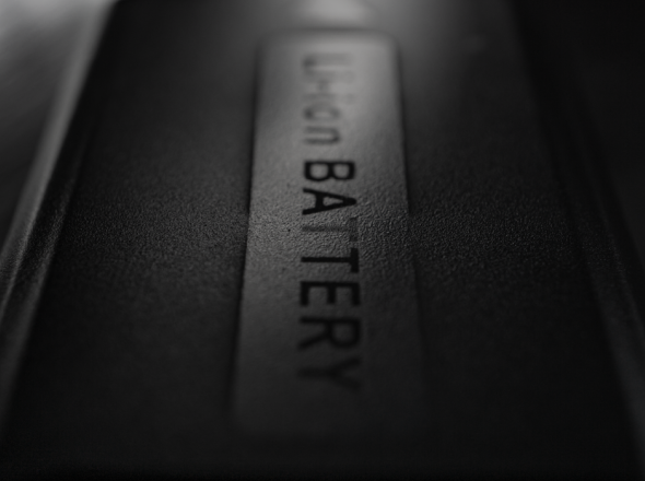 Close-up, black and white view of Li-ion battery labelled "Li-ion BATTERY"