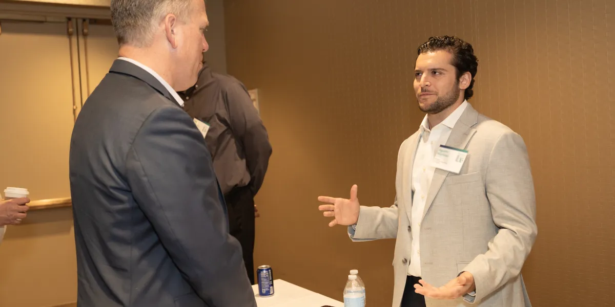 Two Exponent employees chatting