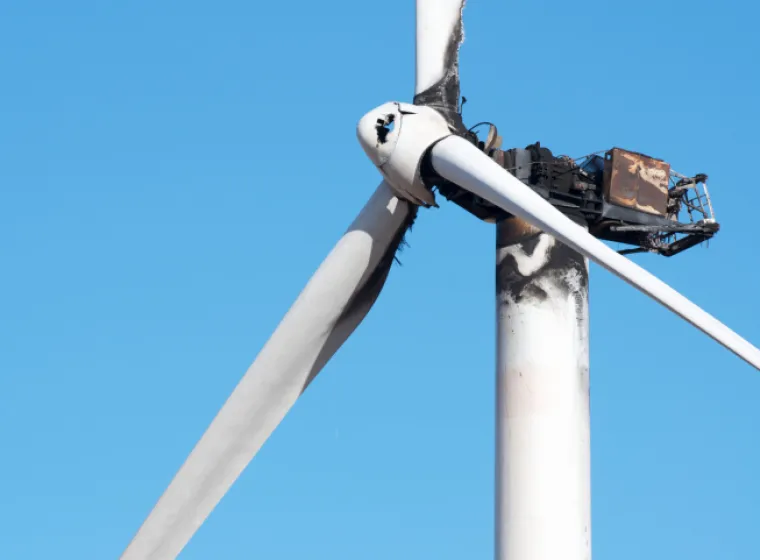 Damaged wind mill that has been burnt