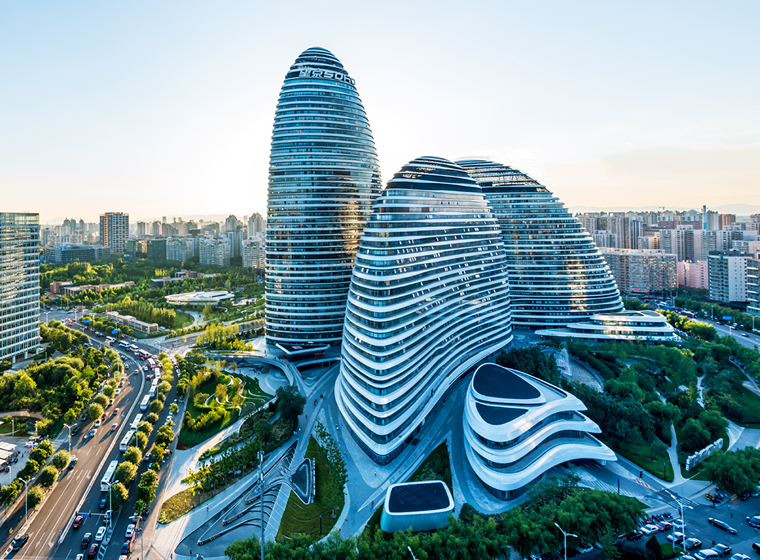 Beijing's skyline filled with modern buildings with interesting curves and architectural features. Exponent civil engineering consulting.