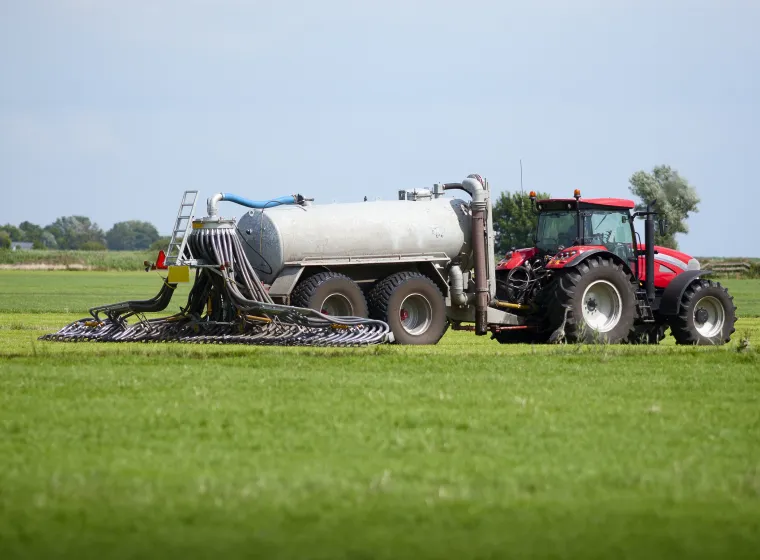 tractor with tank that can directly inject liquid manure into the ground for optimum nutrient placement and odor control