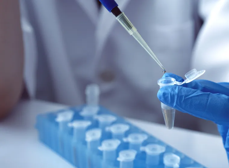 scientist using auto-pipette with Eppendorf consumables tube in the lab,Doing experiment for product,The researchers analyzed to find the results of the experiment.