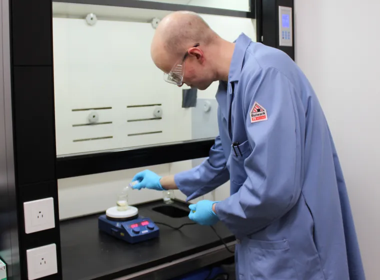 Seattle Lab Scientist Holding a Pipet