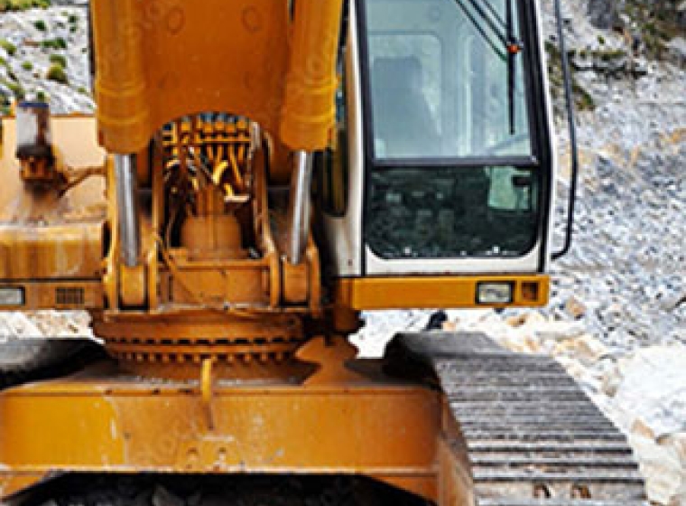 Treads on a construction vehicle