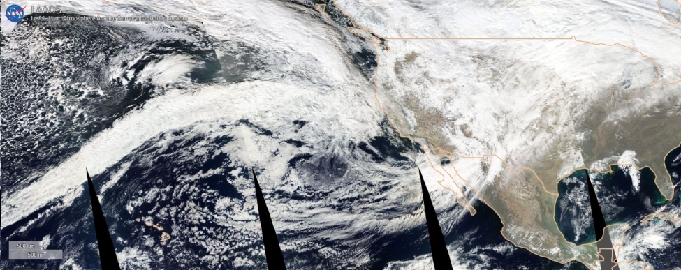 True color image mosaic from NASA’s MODIS instrument aboard the Aqua satellite, taken on Dec. 28, 2022. The band of clouds stretching from the west (left) side of the image to the California coast is the first atmospheric river that brought heavy rainfall in the current series of storms.