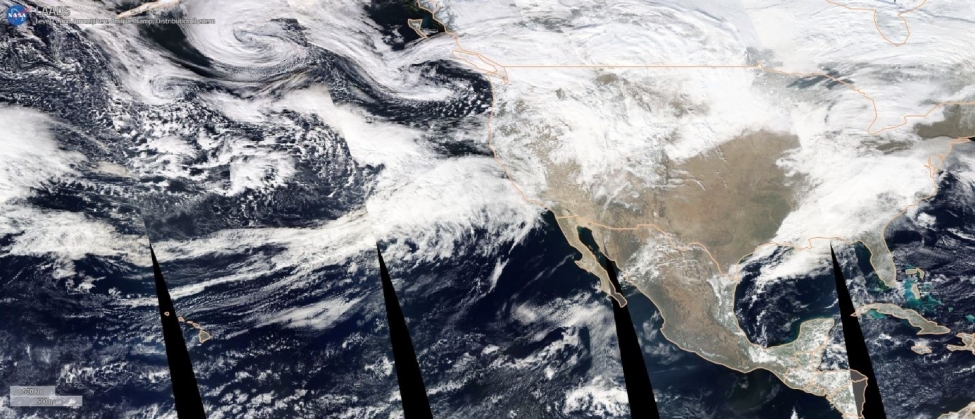 True color image mosaic from NASA’s MODIS instrument aboard the Aqua satellite, taken on Jan. 8, 2023. The band of clouds stretching from north of Hawaii to the California coast is forecasted to bring additional rainfall starting late in the evening Jan. 8 through Jan. 10.
