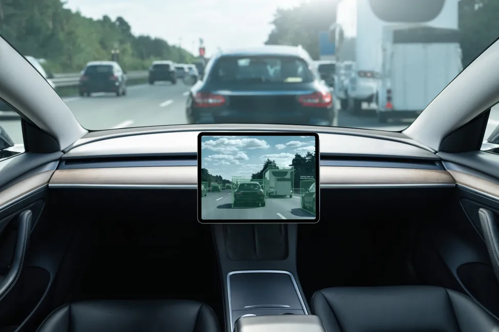 Self driving car on a road. Autonomous vehicle. Inside view.