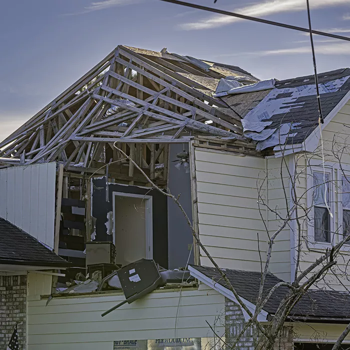 Close up of house damaged by hurricane