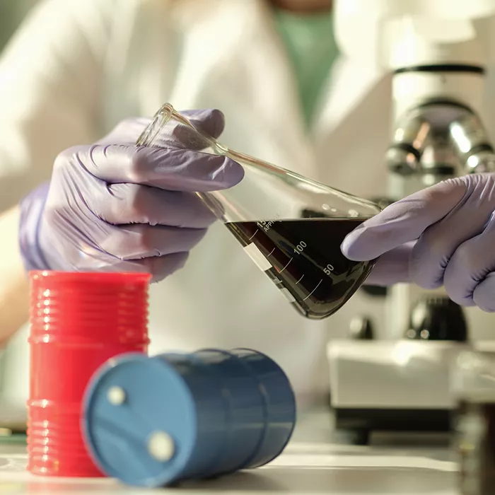 Scientist holding a beaker