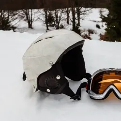 Ski helmet and ski goggles isolated on white background