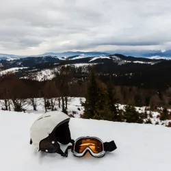 Ski helmet and ski goggles isolated on white background