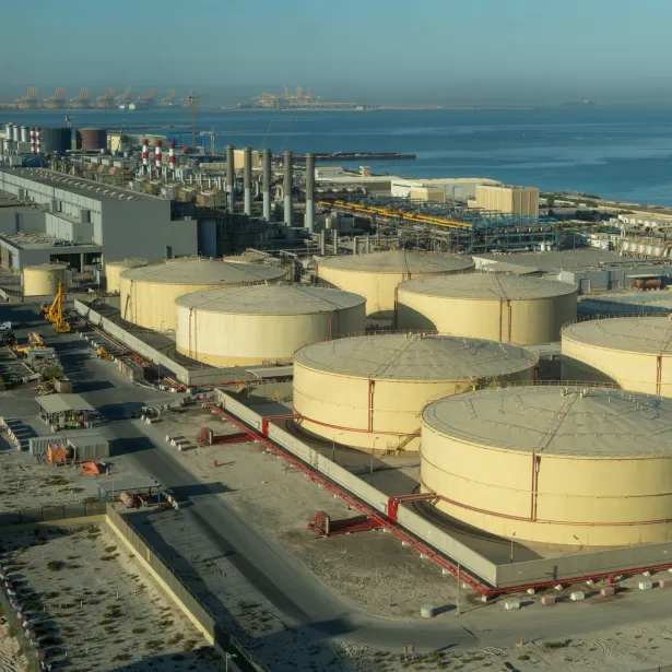 Middle East water and gas containers along the coastline for gas, water and oil concepts. Industrial zone.