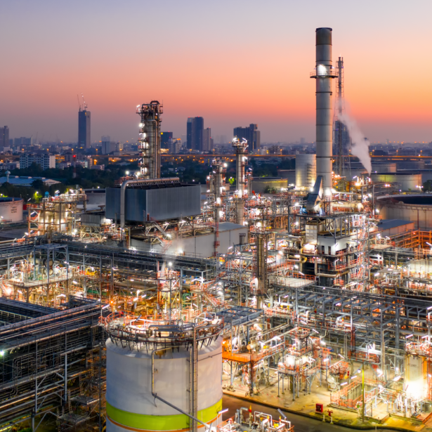A view of an oil refinery lit up at night 