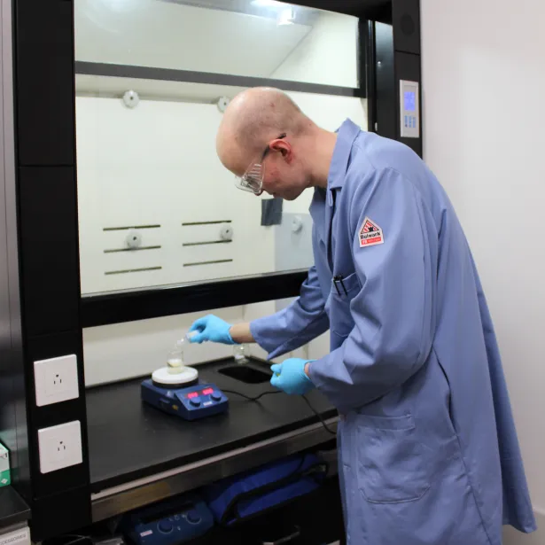 Seattle Lab Scientist Holding a Pipet