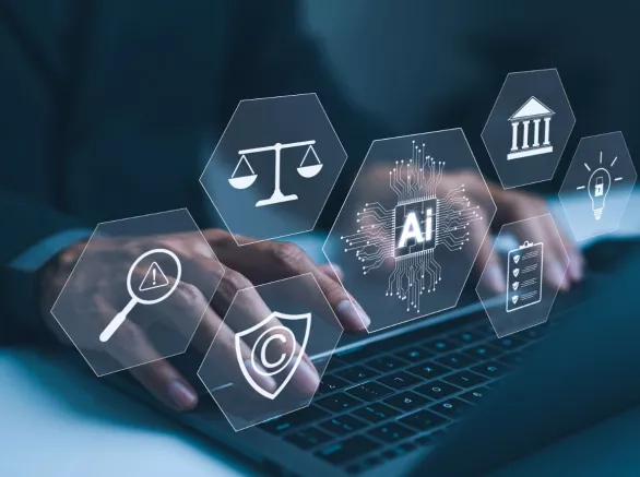 Hand typing on laptop with digital icons representing artificial intelligence, legal standard, ethics, and regulatory compliance, Technology law and policy, copyright,