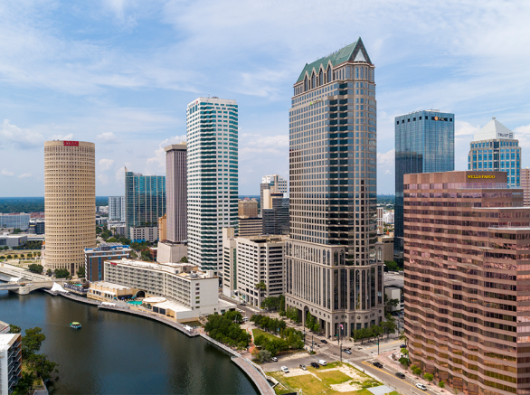 Downtown Tampa against a blue skyline. 
