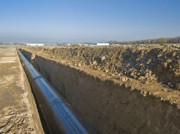 Natural gas pipeline in an excavated manhole
