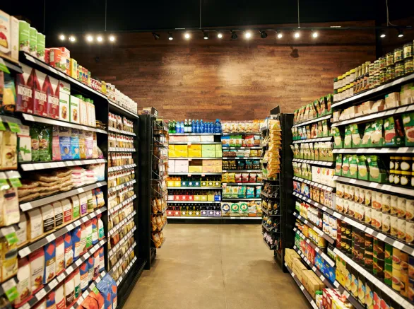 Shot of fully stocked isles in a grocery store during the day