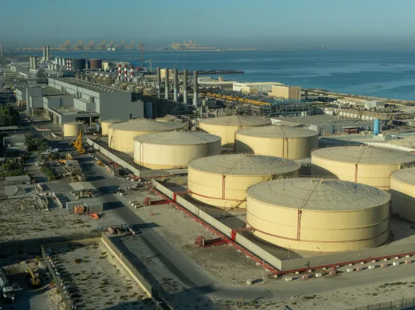 Middle East water and gas containers along the coastline for gas, water and oil concepts. Industrial zone.
