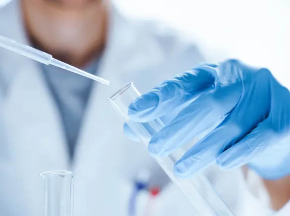 Microbiological research with a test tube and micropipette in close -up