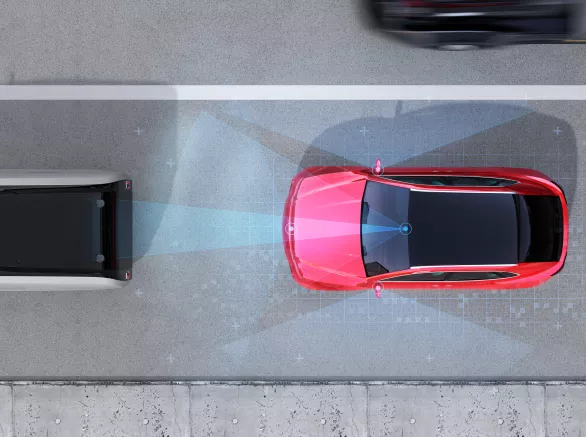 Aerial view of red SUV emergency braking to avoid car crash
