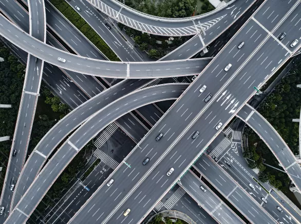 Aerial view of highway and overpass in city