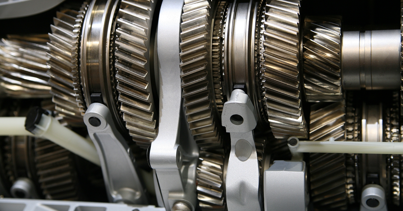 Artistic photo of mechanical gears. Exponent provides mechanical engineering support for disputes and claims.  