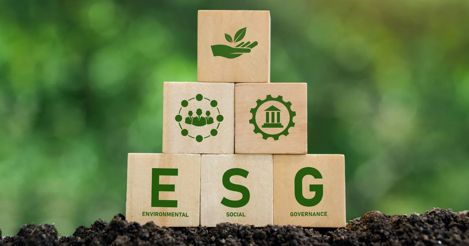 Stack of wooden blocks spelling the words Environmental Social Governance. Exponent provides environmental sustainability consulting.