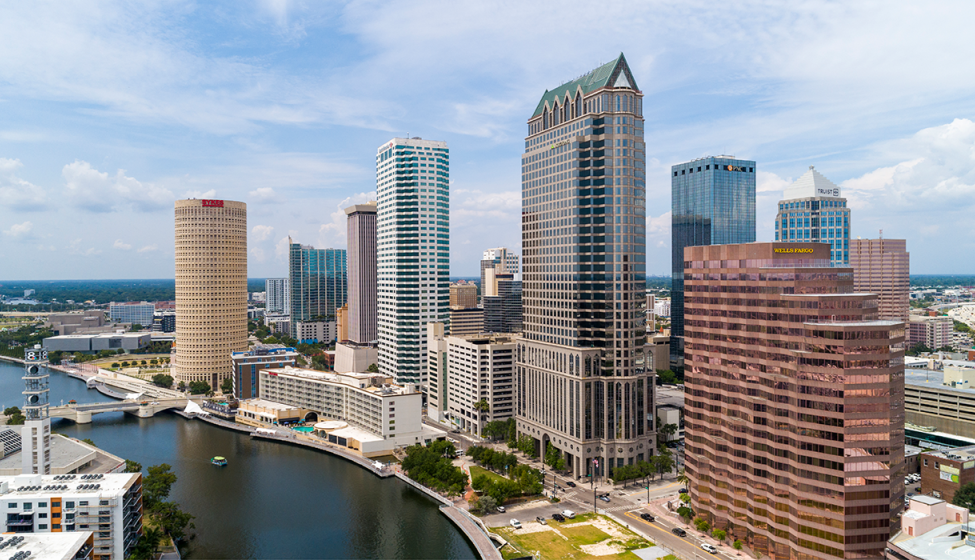 Downtown Tampa against a blue skyline. 