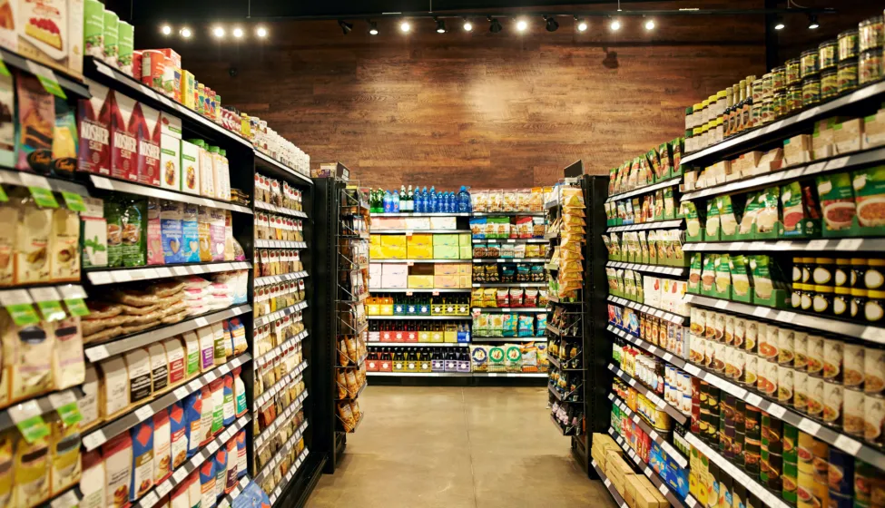 Shot of fully stocked isles in a grocery store during the day