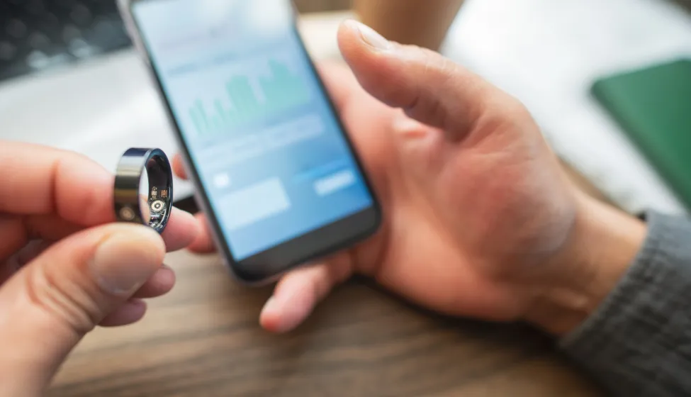 Man with smart ring indoors