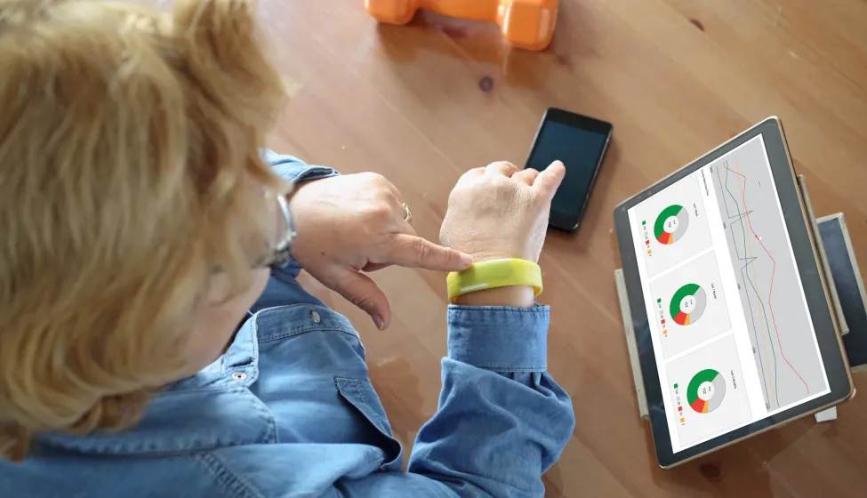 Senior woman using health technology