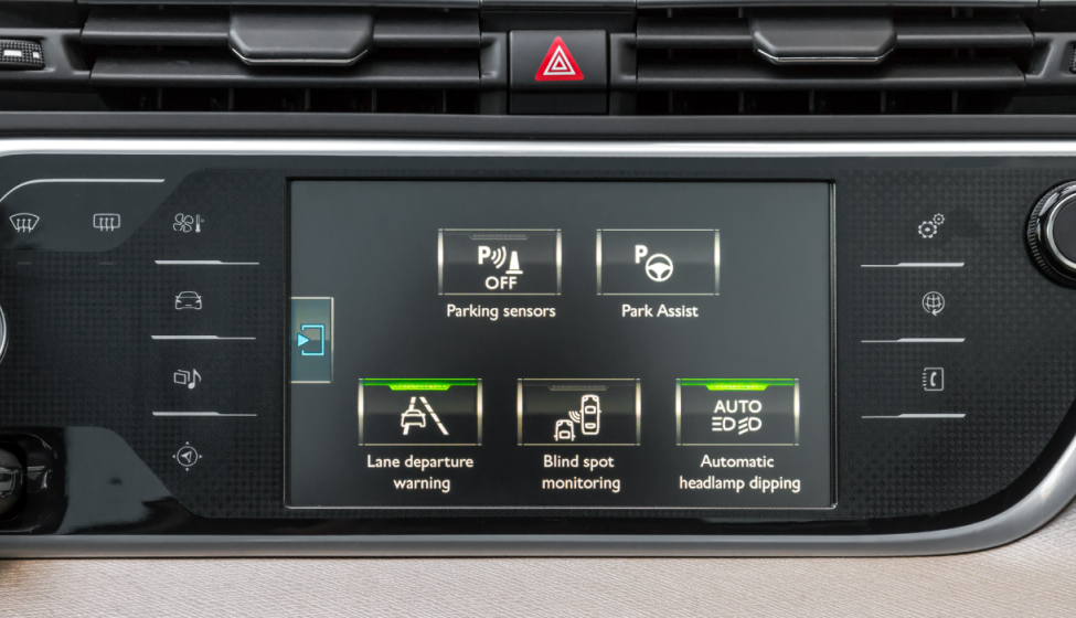 Advanced driver assistance systems buttons on the interface of a vehicle dashboard