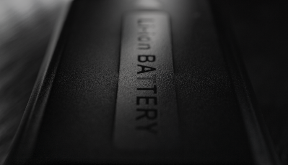 Close-up, black and white view of Li-ion battery labelled "Li-ion BATTERY"