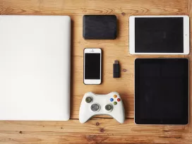 High angle shot of wireless technology on a wooden table