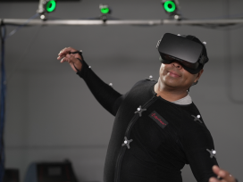 Test subject wearing a virtual reality headset. Exponent researchers analyze human behaviors.